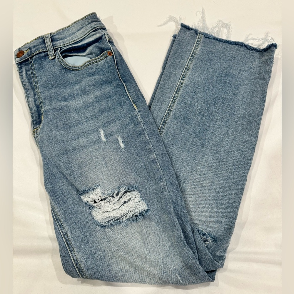 Distressed Blue Women's Jeans by Sneakpeek.